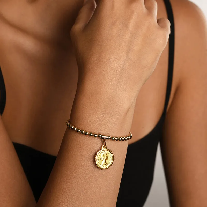 BALL BRACELET WITH ANTIQUE THREEPENCE