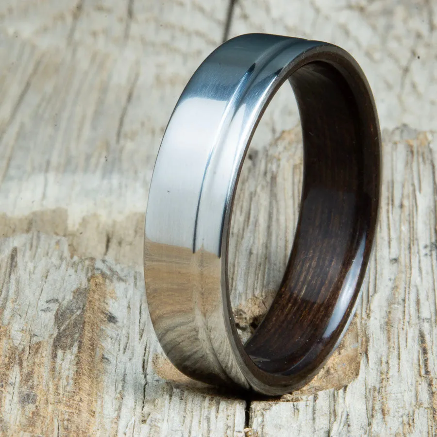 Bentwood Ebony ring with 6mm polished titanium offset groove outer