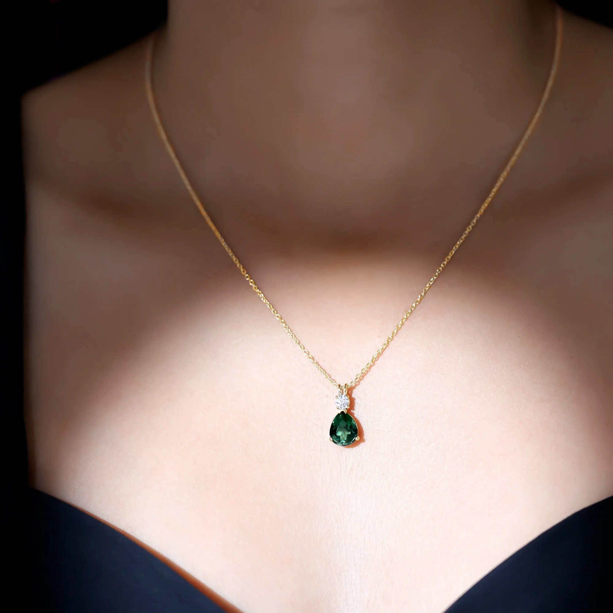 Pear Cut Created Green Sapphire Drop Pendant with Moissanite