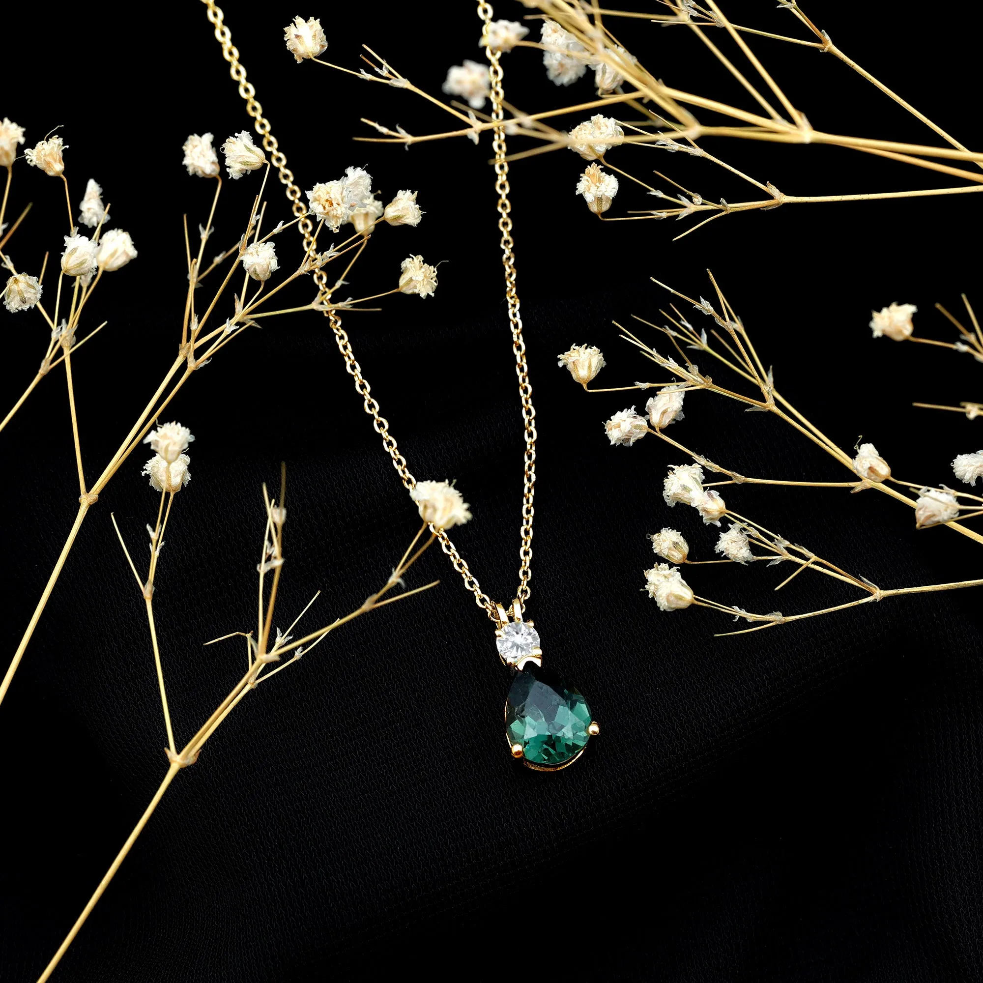 Pear Cut Created Green Sapphire Drop Pendant with Moissanite