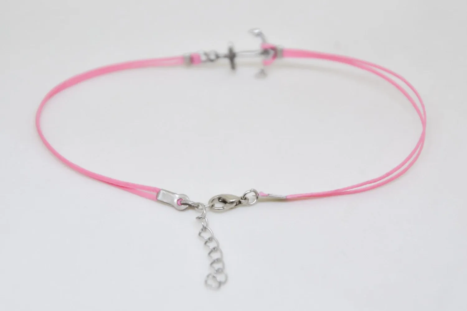Pink dainty anklet with a silver anchor charm, nautical jewelry