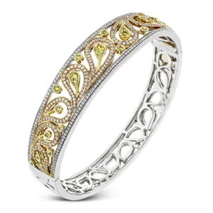 The delicate filigree style of this vintage style bangle bracelet is accented with 1.63 ctw white diamonds and.56 ctw yellow diamonds.